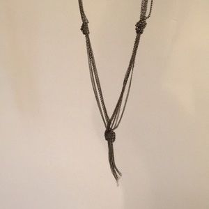 Long gold knot necklace